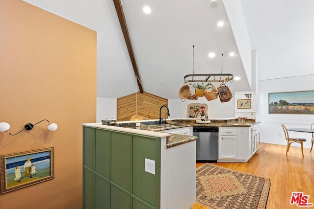 kitchen with white cabinets, green cabinetry, stainless steel dishwasher, vaulted ceiling with beams, and light hardwood / wood-style floors