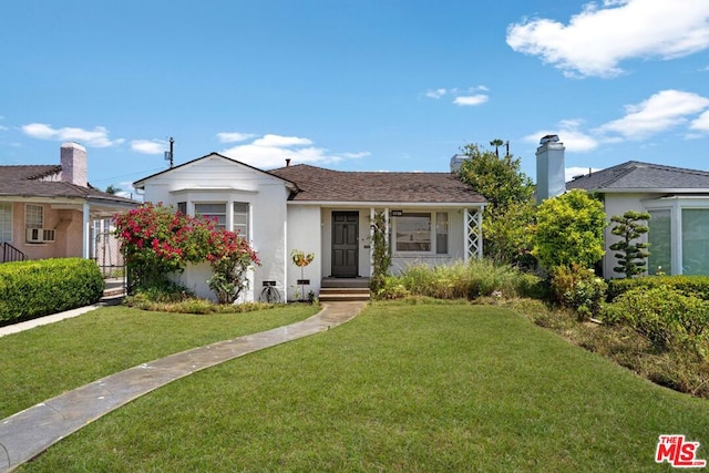 bungalow with a front lawn