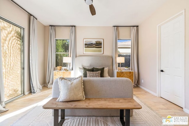 sitting room featuring ceiling fan and light hardwood / wood-style floors