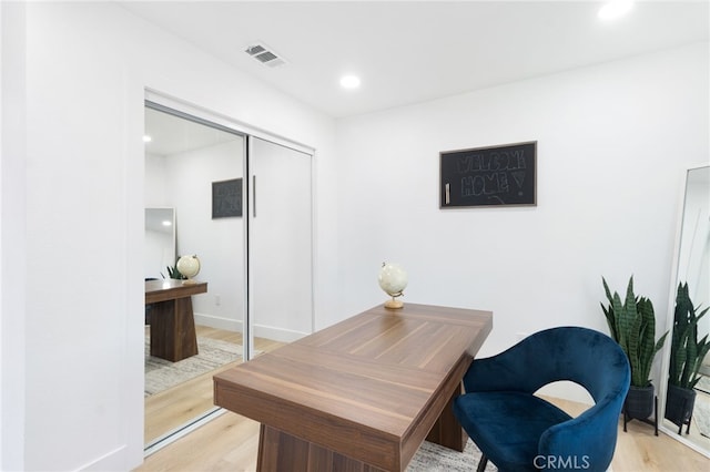 office space featuring light wood-type flooring