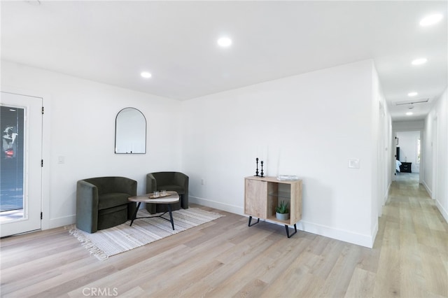 sitting room featuring light wood-type flooring