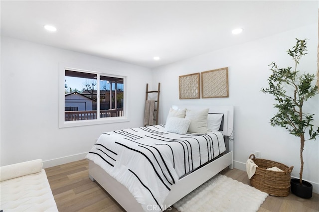 bedroom featuring light hardwood / wood-style flooring