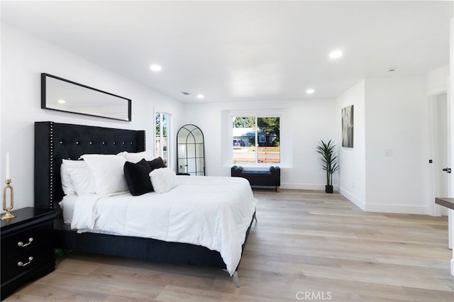 bedroom featuring light hardwood / wood-style flooring