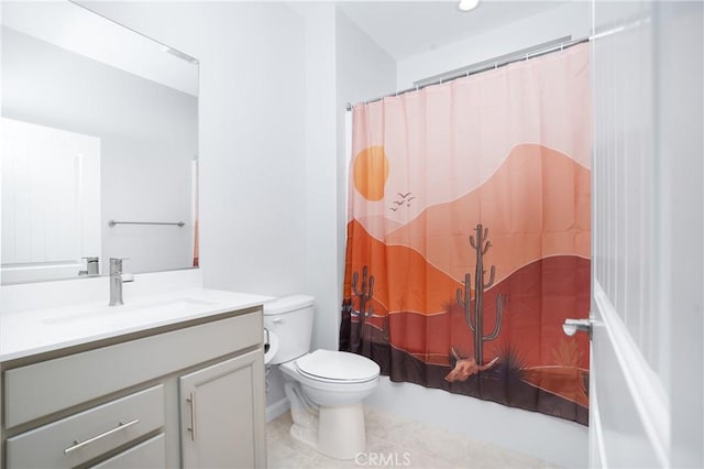 bathroom featuring toilet, tile patterned floors, and vanity