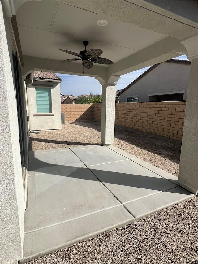 view of patio with ceiling fan