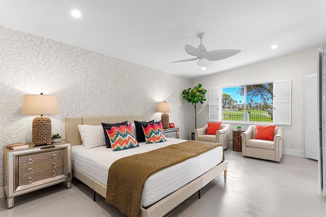 bedroom with concrete flooring and ceiling fan