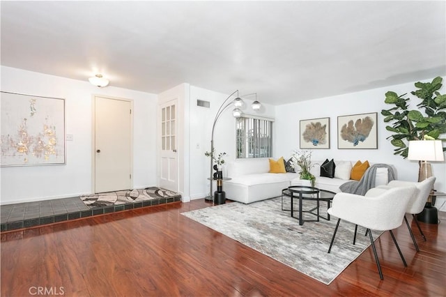 living room with dark wood-type flooring