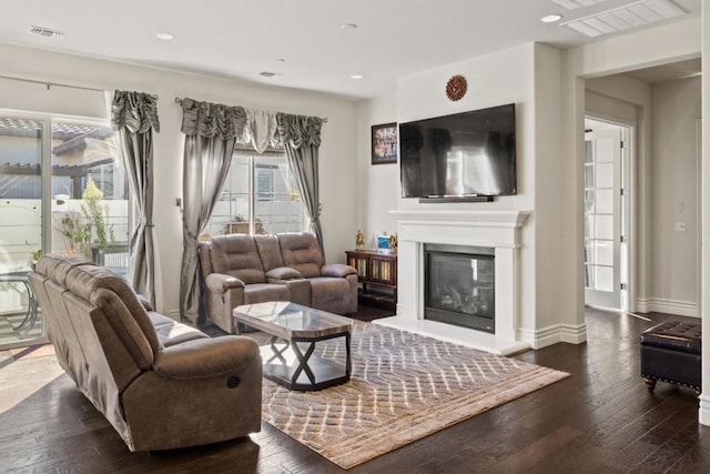 living room with dark wood-type flooring