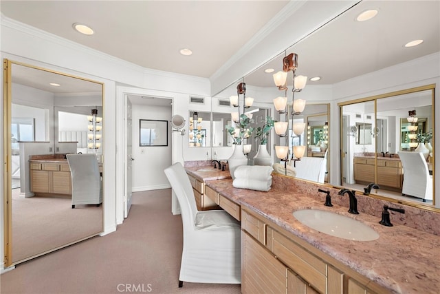 bathroom featuring vanity and crown molding