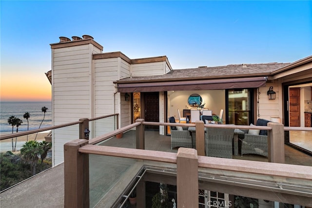 deck at dusk with a water view