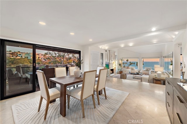 dining space featuring light tile patterned flooring