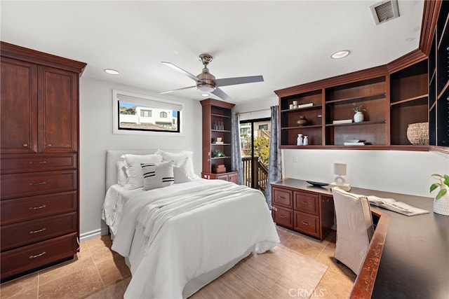 tiled bedroom featuring built in desk, ceiling fan, and access to outside