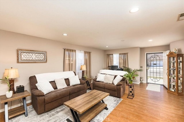 living room with light wood-type flooring