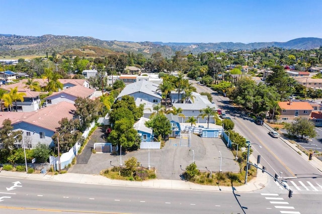 drone / aerial view featuring a mountain view