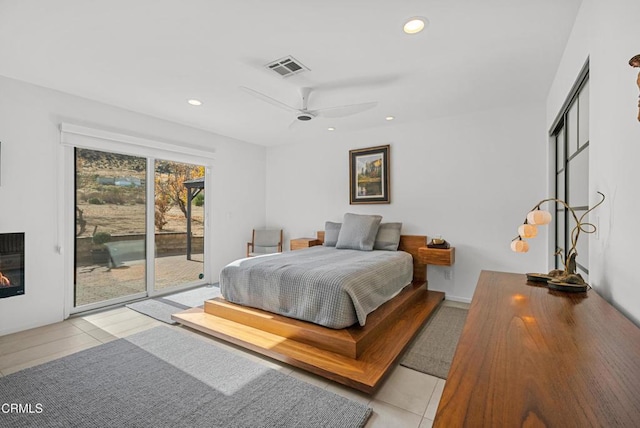 bedroom with access to outside, ceiling fan, and light tile patterned flooring