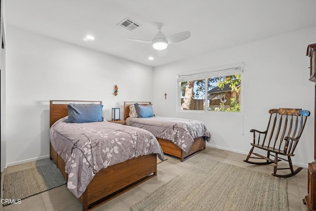 bedroom featuring ceiling fan and light tile patterned flooring