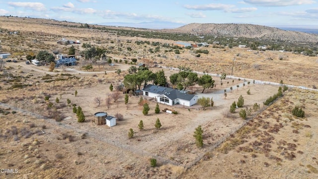 aerial view with a mountain view and a rural view