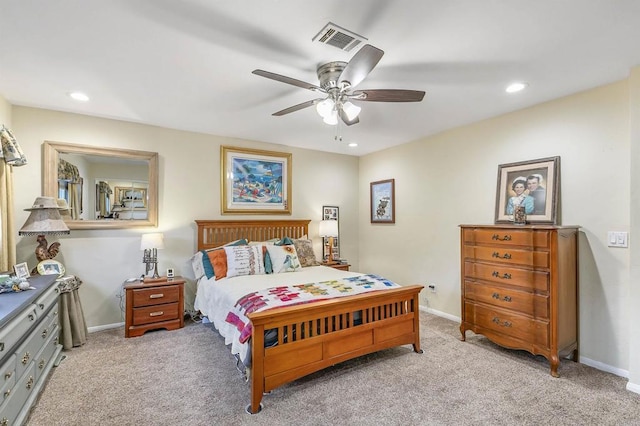 bedroom featuring ceiling fan and light colored carpet