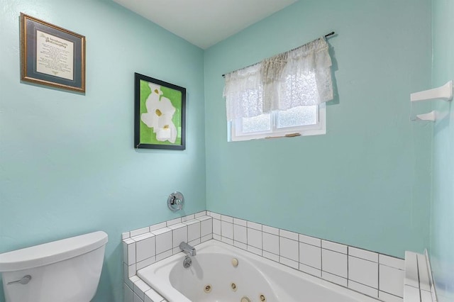 bathroom with a relaxing tiled tub and toilet