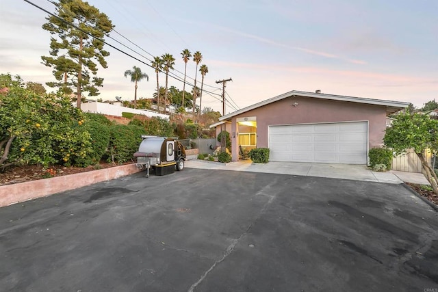 view of front of home with a garage