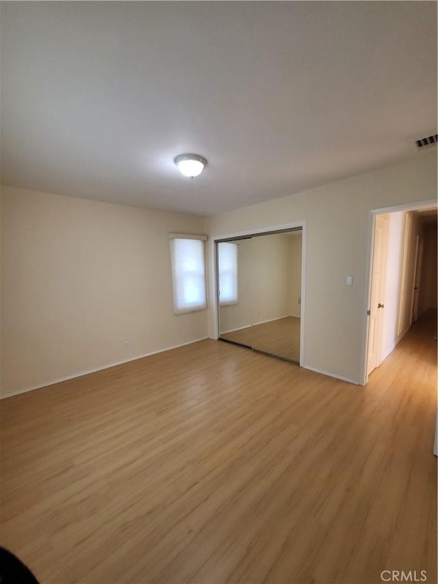 empty room featuring light wood-type flooring