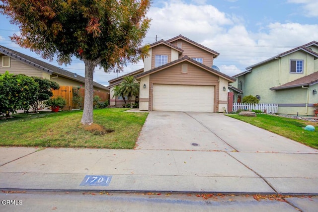 front facade with a front yard and a garage