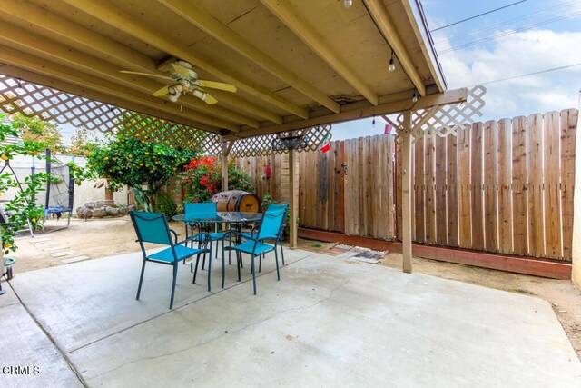 view of patio featuring ceiling fan