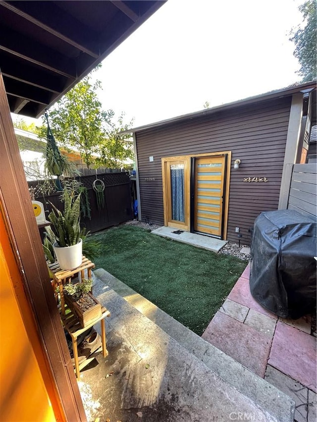 view of yard with a patio area