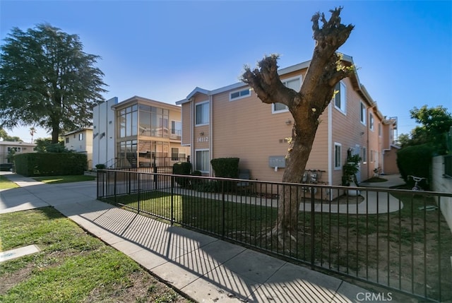 view of home's exterior featuring a yard