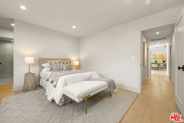 bedroom featuring light wood-type flooring