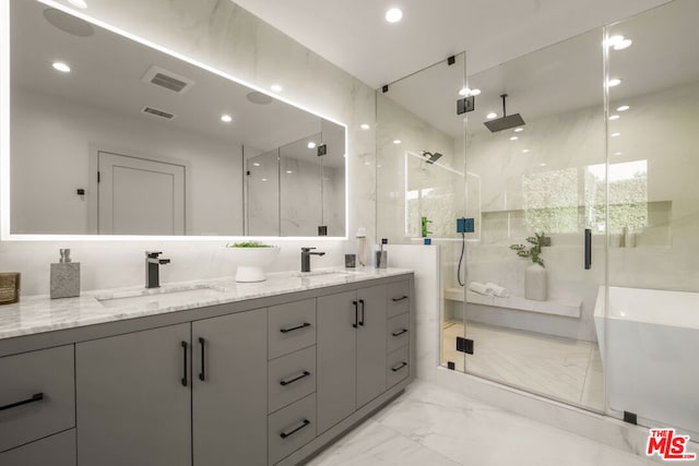 bathroom with vanity and walk in shower