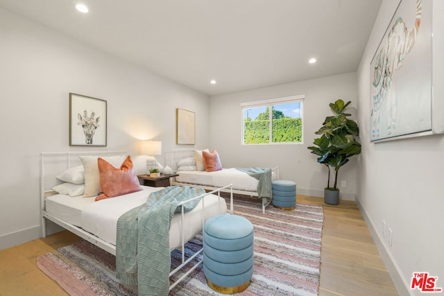 bedroom featuring light wood-type flooring