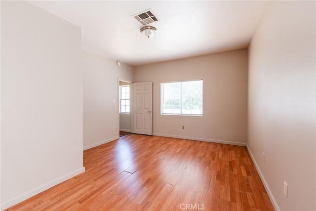 empty room featuring light wood-type flooring