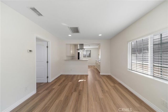 interior space with hardwood / wood-style flooring