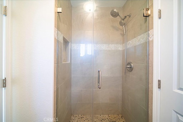 bathroom featuring walk in shower