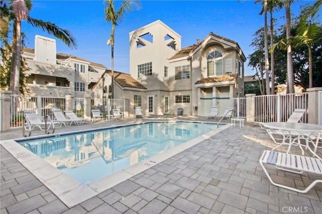 view of swimming pool featuring a patio