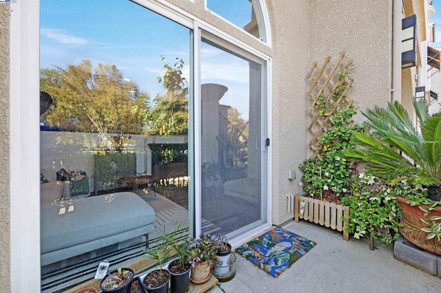 entrance to property featuring radiator