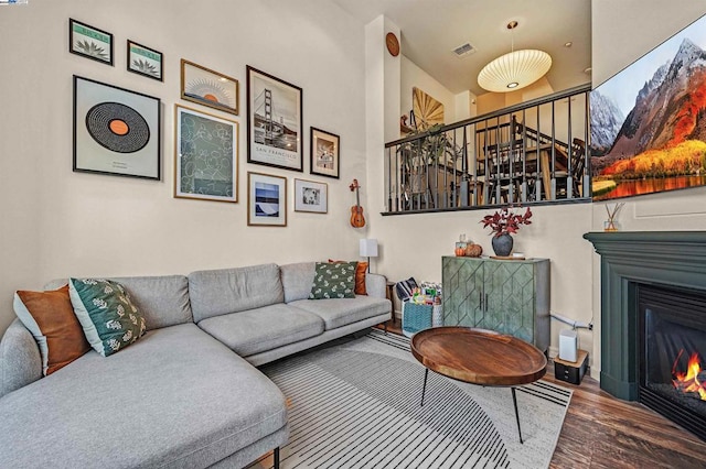 living room with dark wood-type flooring