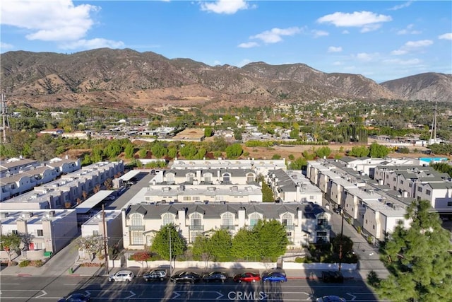 drone / aerial view featuring a mountain view