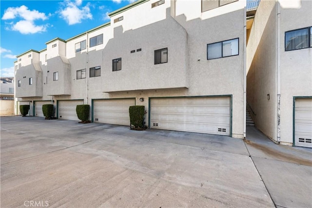 exterior space with a garage