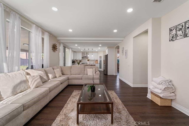 living room featuring dark hardwood / wood-style floors