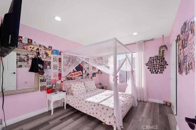 bedroom featuring hardwood / wood-style floors