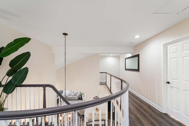 corridor featuring dark hardwood / wood-style flooring