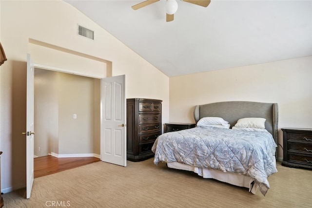 bedroom featuring ceiling fan, light hardwood / wood-style floors, and high vaulted ceiling