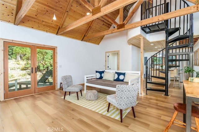 sitting room with french doors, high vaulted ceiling, wooden ceiling, and light hardwood / wood-style flooring