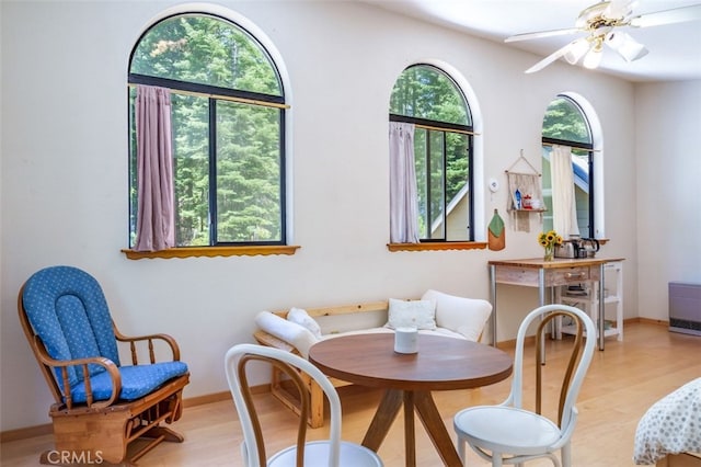 sitting room featuring ceiling fan and light hardwood / wood-style floors