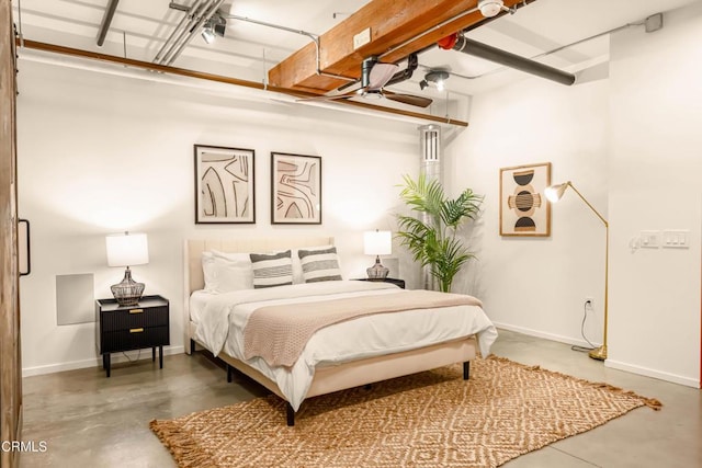 bedroom featuring concrete floors and ceiling fan