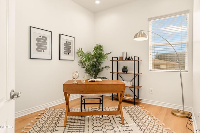 office space featuring hardwood / wood-style floors