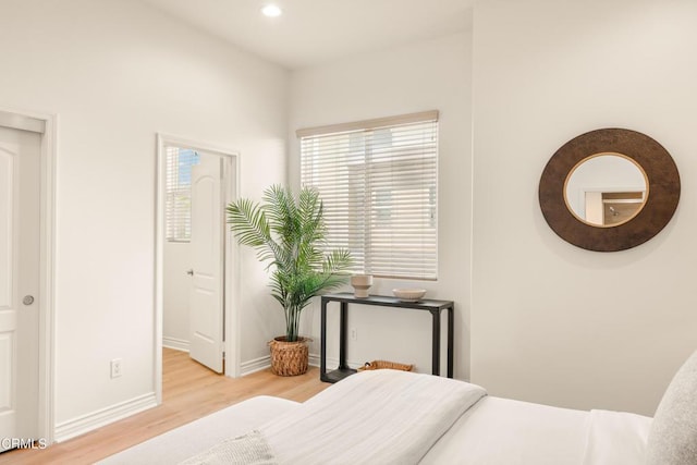 bedroom with light wood-type flooring