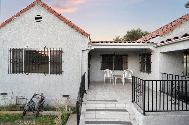 exterior space featuring covered porch